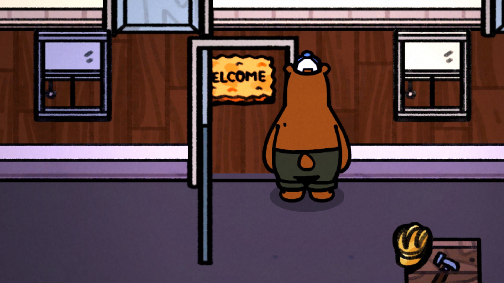 Captura de pantalla de un tapete de bienvenida desalineado con la puerta en Bear And Breakfast.