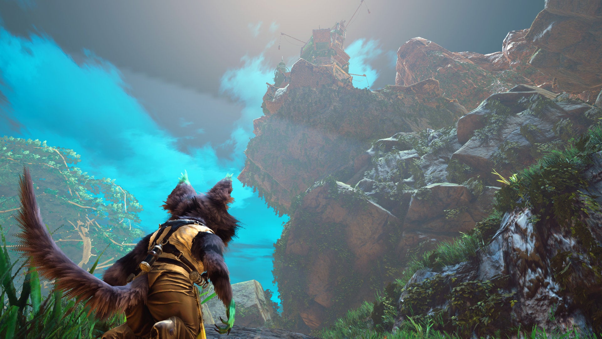 A Biomutant screenshot of the main character looking up at a tall structure atop a mountain.