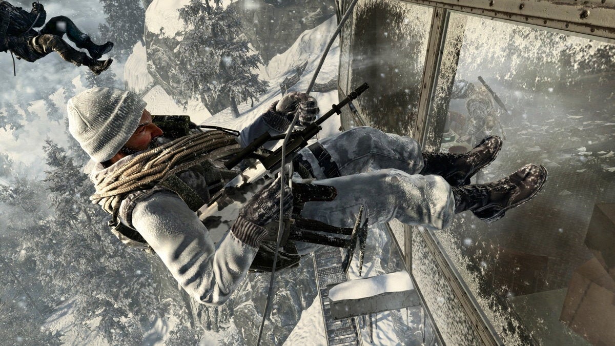 A snowy soldier abseils down a glass wall in Call Of Duty: Black Ops