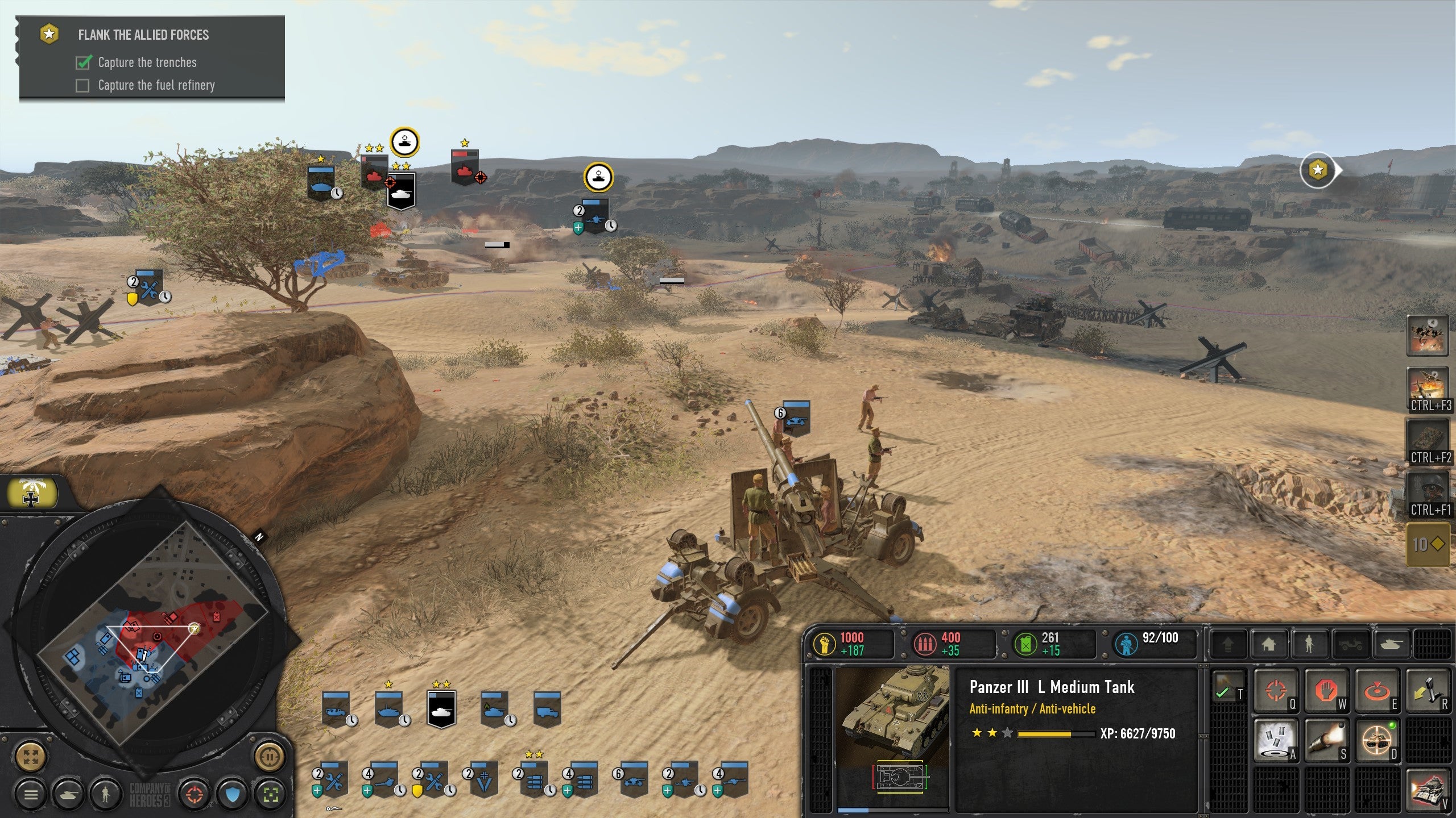An artillery gun prepares to fire across the desert in Company Of Heroes 3
