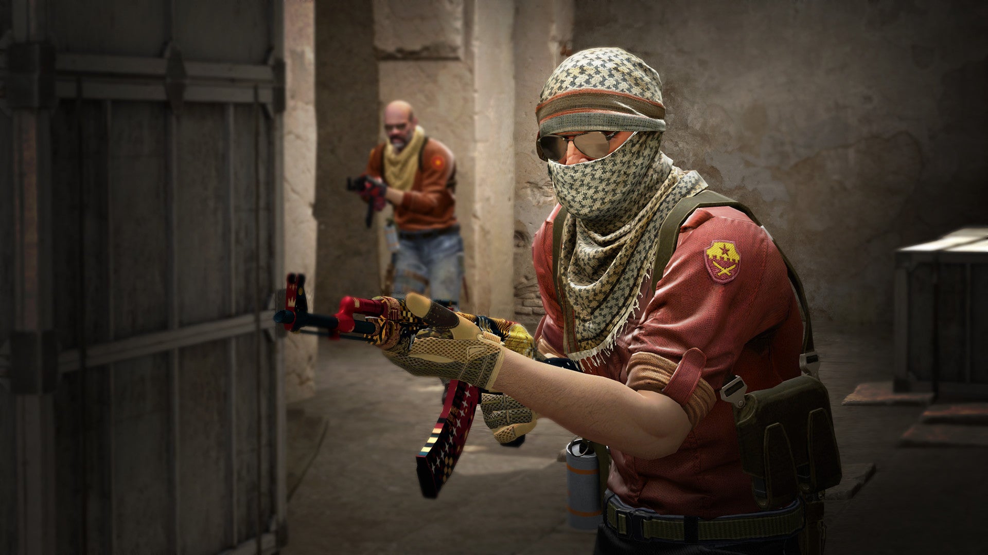 A man holds a gaudy AK-47 in a Counter-Strike: Global Offensive screenshot.