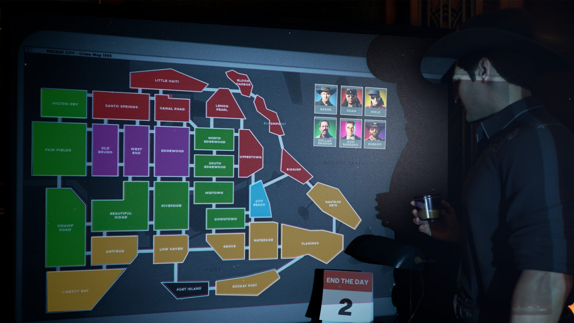 A screenshot from Crime Boss: Rockay City which shoes Michael Madsen looking at a map of Rockay City's various territories, which are all colour-coded according to gang affiliation.