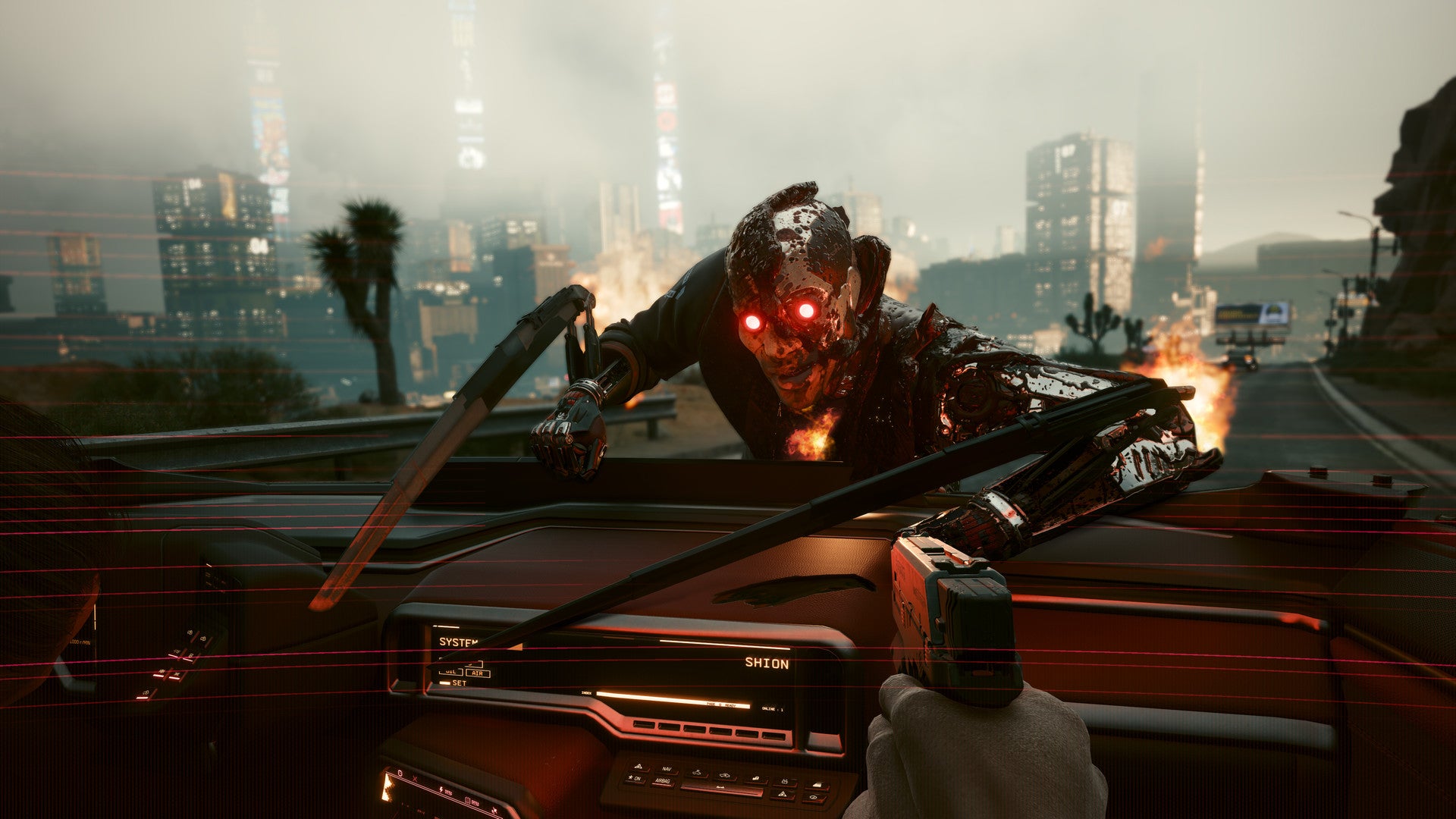 A red-eyed cyborg with machete arms climbs through the windshield of a car in Cyberpunk 2077.