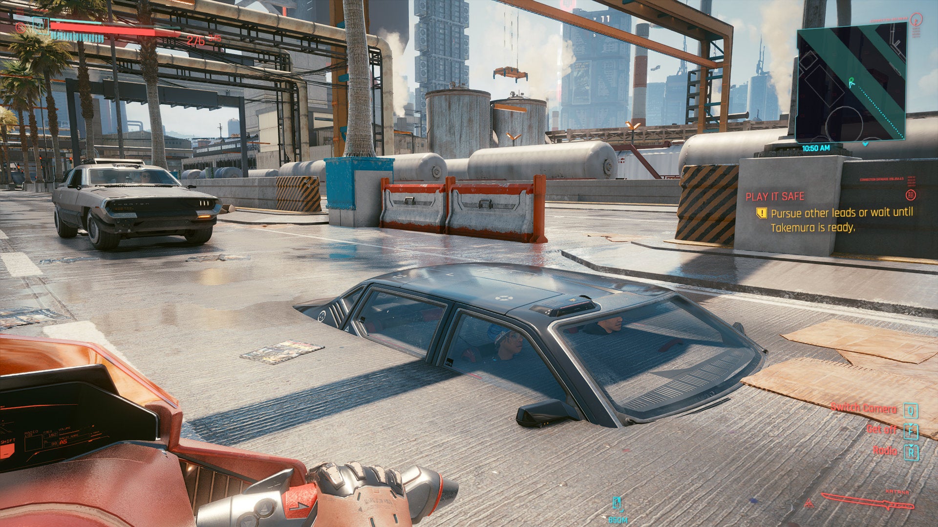 Two people sat in a car which has sunk deep into the road in a Cyberpunk 2077 screenshot.