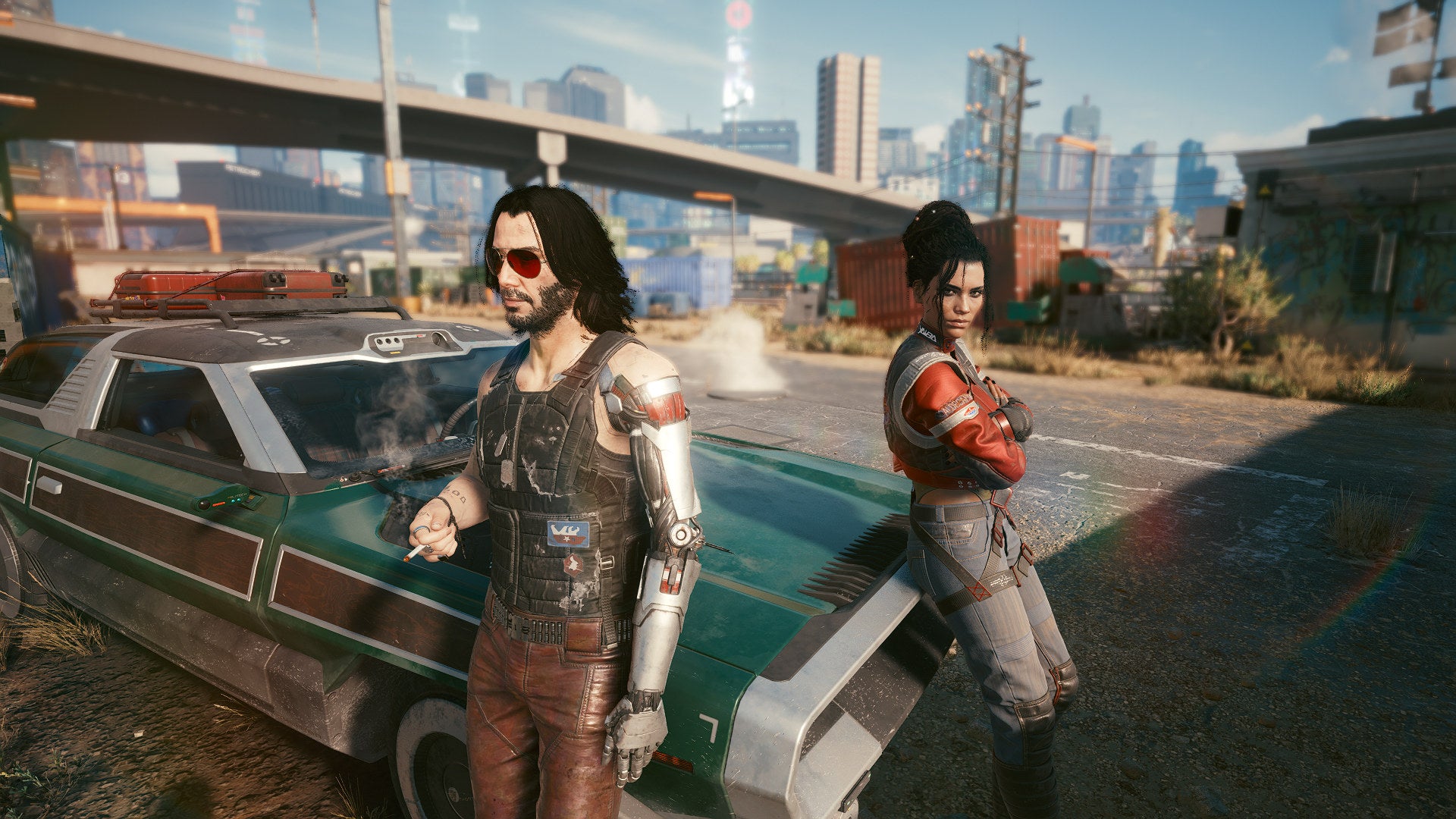 Johnny and Panam lean against a car in a Cyberpunk 2077 screenshot.