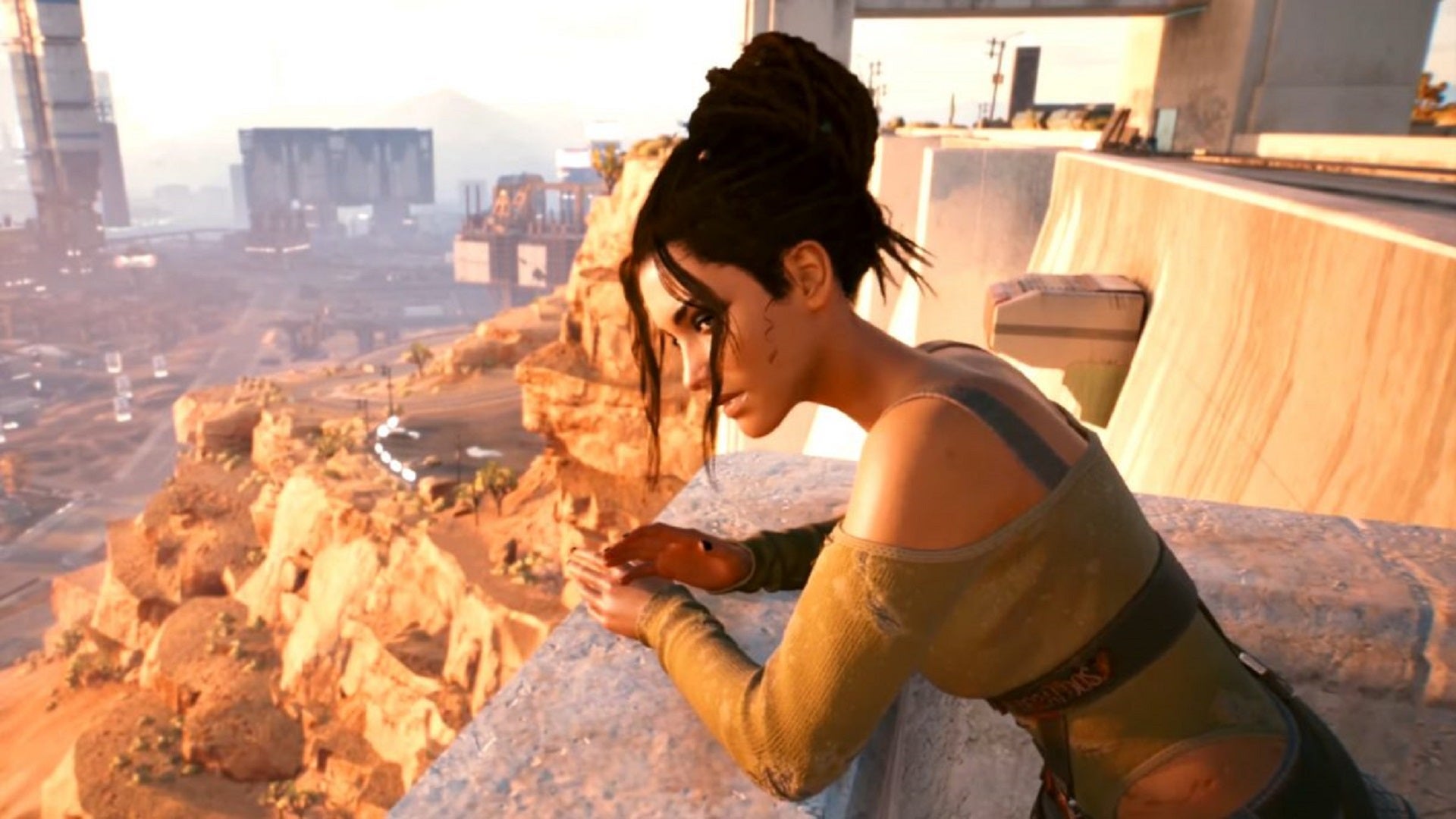 Panam from Cyberpunk 2077, as she leans on a balcony overlooking a nomad settlement.