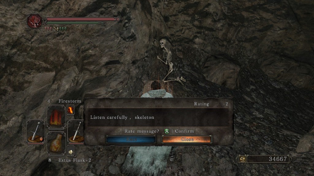 The player in Dark Souls reads a message left by another: "Listen carefully, skeleton"