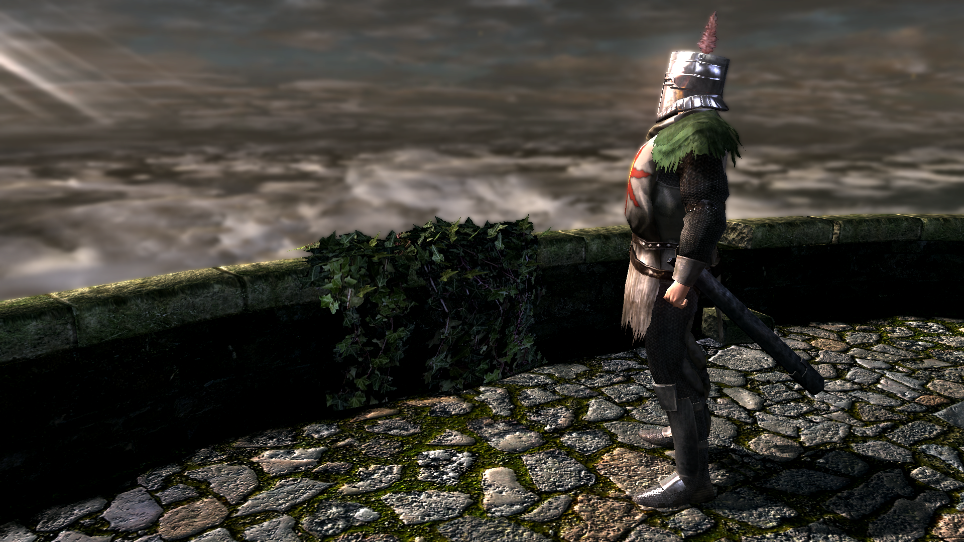 Solaire, the odd sun-worshipping knight in Dark Souls, stands facing towards the object of his affection on the edge of a stony paved area open to the sky