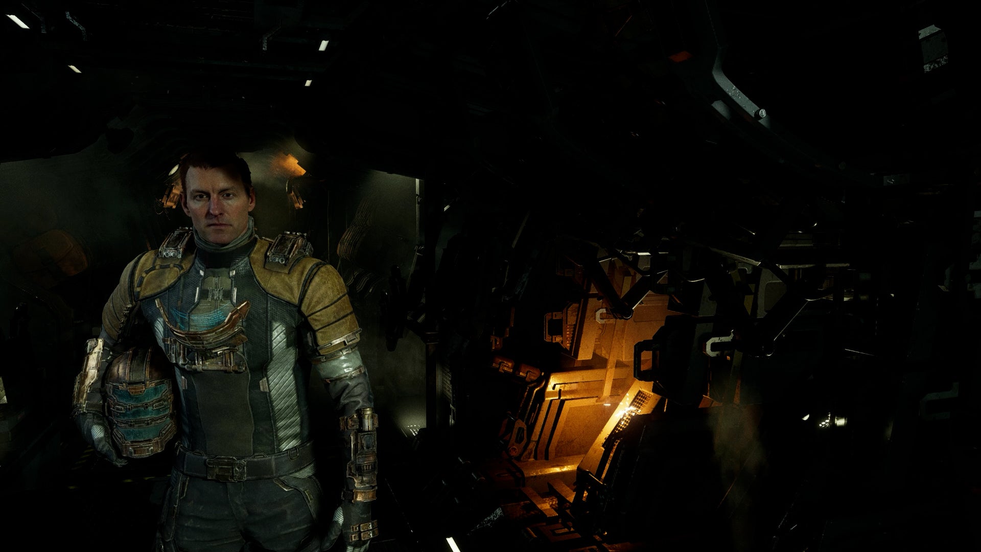 Isaac stares at the camera without his helmet on in Dead Space