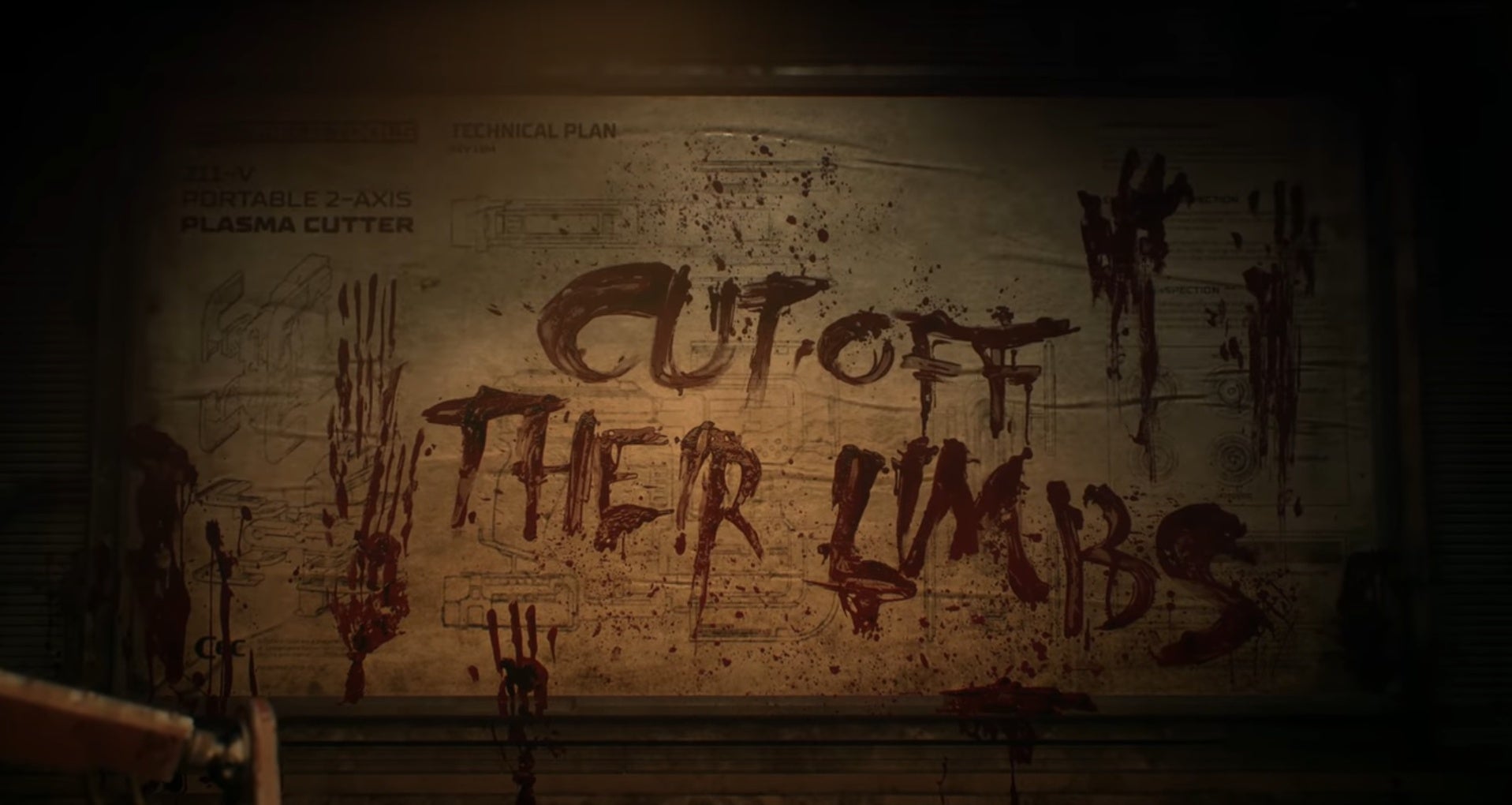 A still from the Dead Space remake reveal trailer, showing the words "Cut off their limbs" scrawled on a wall in blood by a person who presumably had lost their pen.