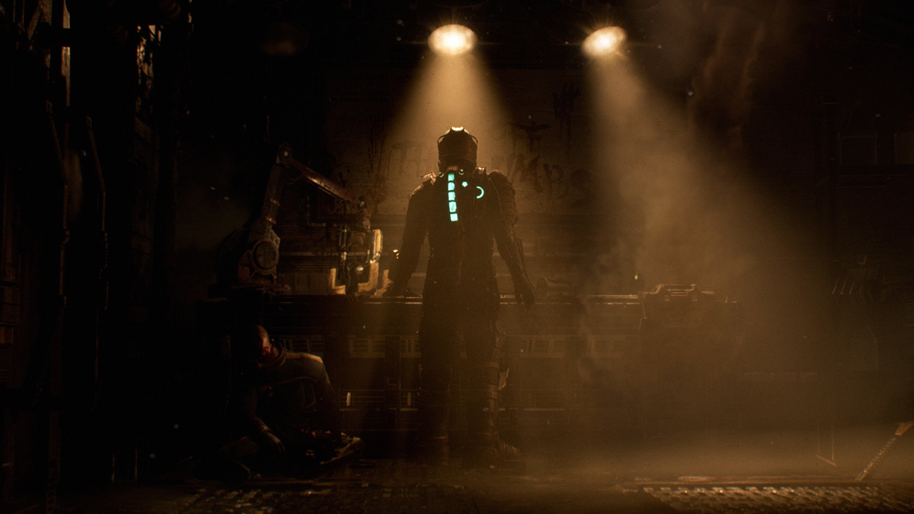 Isaac stands at a workbench in the Dead Space remake.