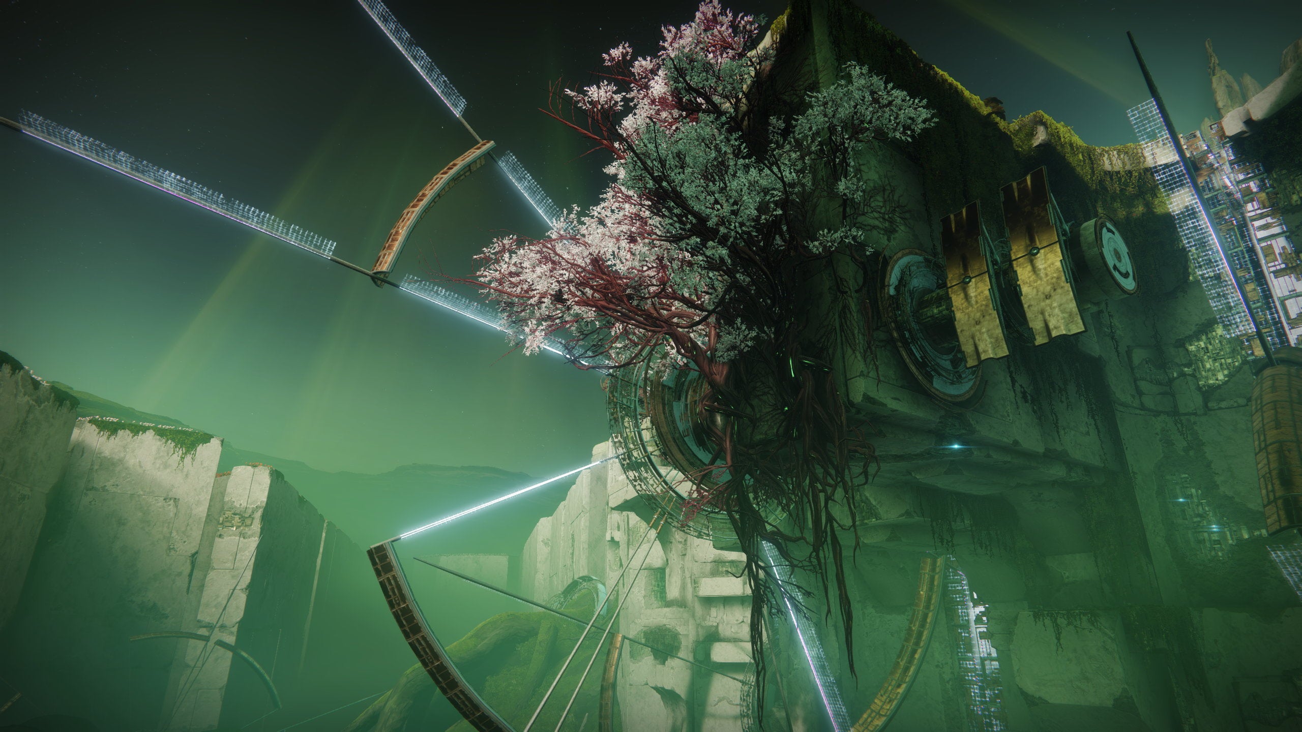 A tree blossoms atop a weird cybernetic wheel in a Destiny 2: Garden of Salvation screenshot.