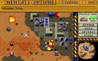 A city is bombed by tanks and cannons in Dune II: The Building Of A Dynasty