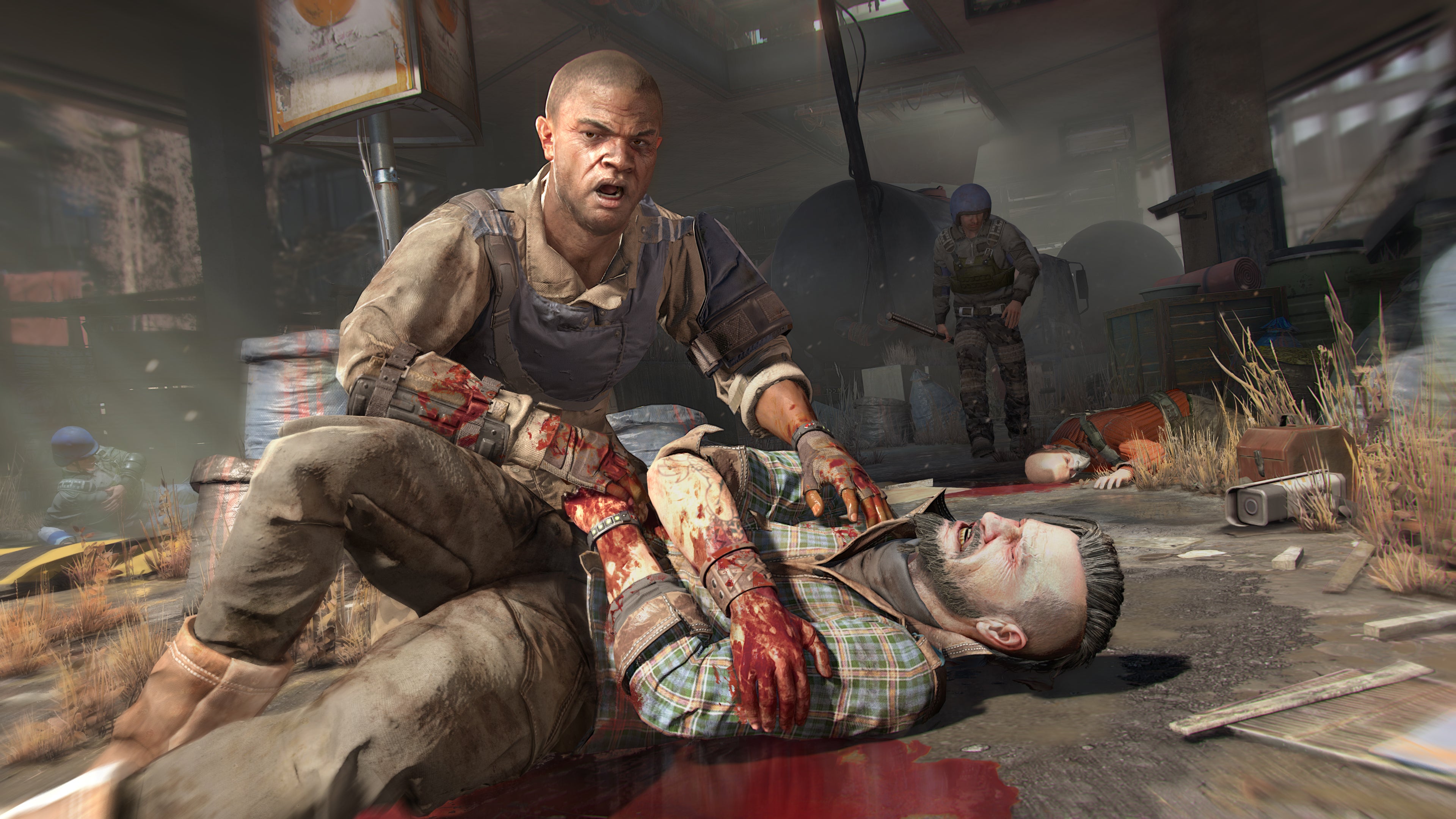 Two men, one slumped and bleeding, in a Dying Light 2 screenshot.