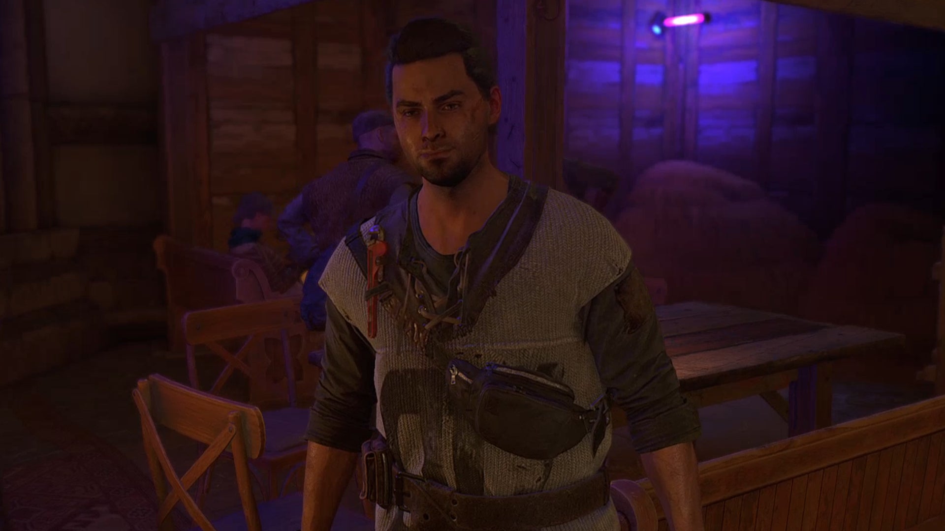 A close-up of Carlos, a member of the Bazaar in Dying Light 2.