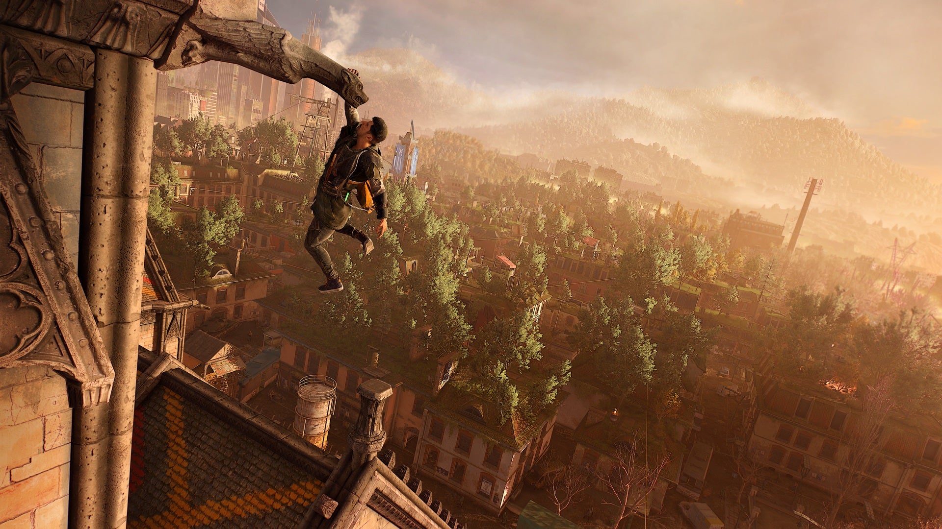 A character hangs precariously by one hand from a high vantage point above the city in Dying Light 2.