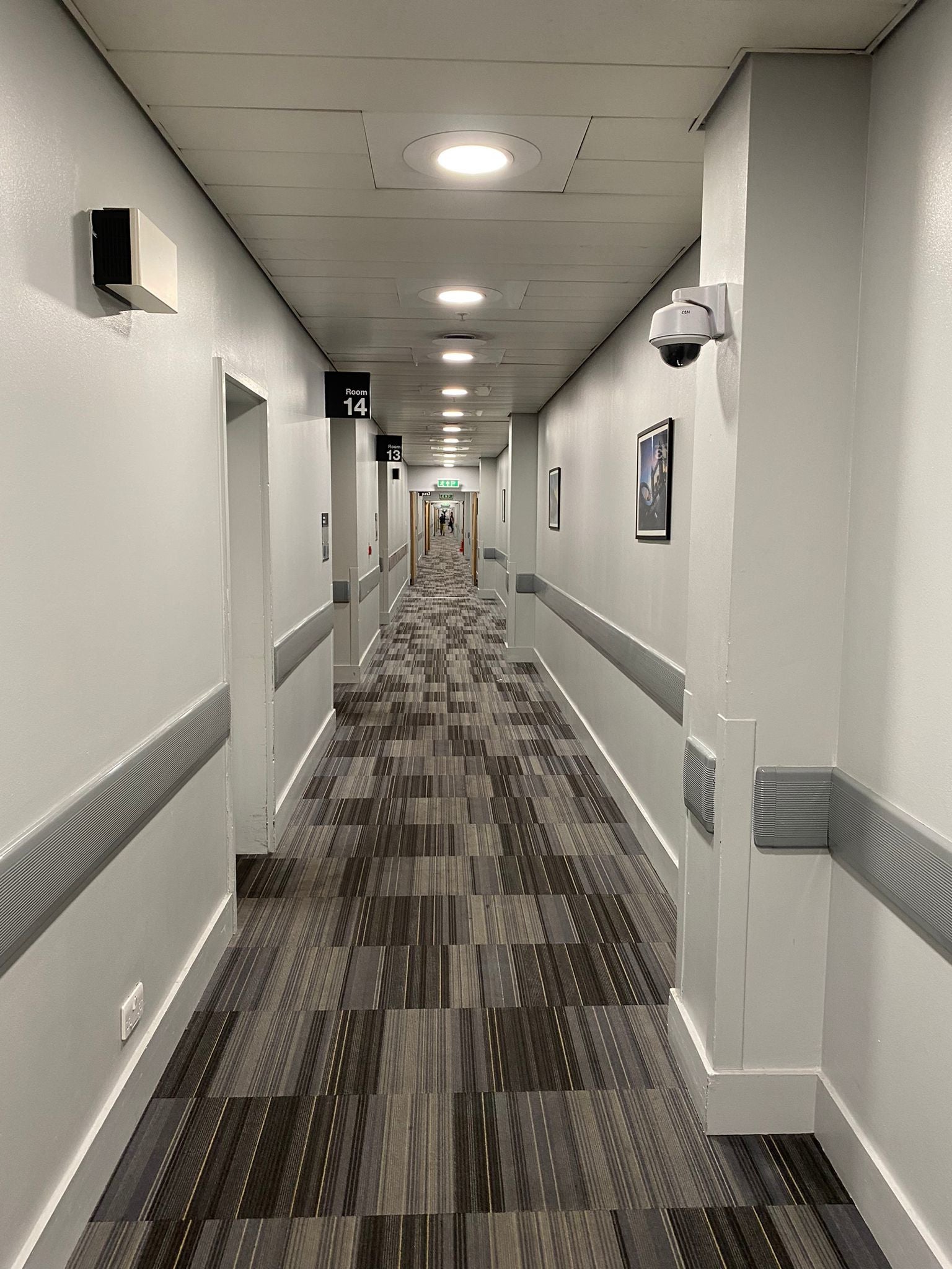A photo of a bleak endless corridor.