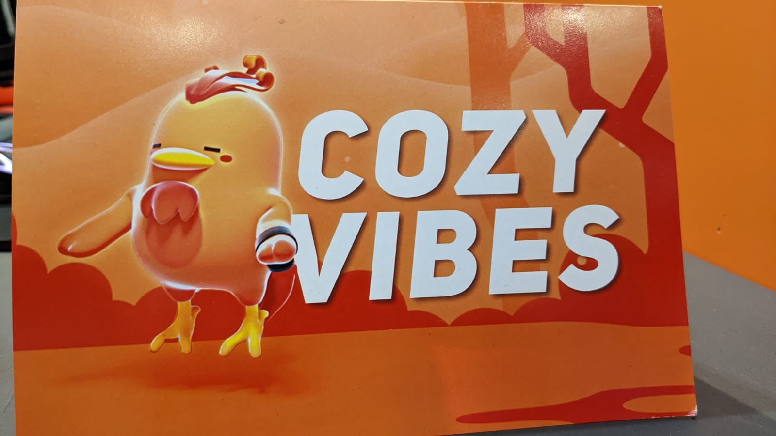 A 'cozy vibe' sign at EGX 2022.