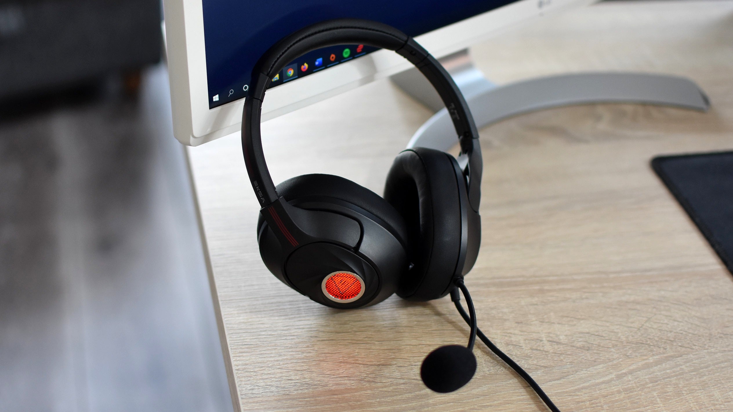 The EKSA Air Joy Plus gaming headset on a desk.