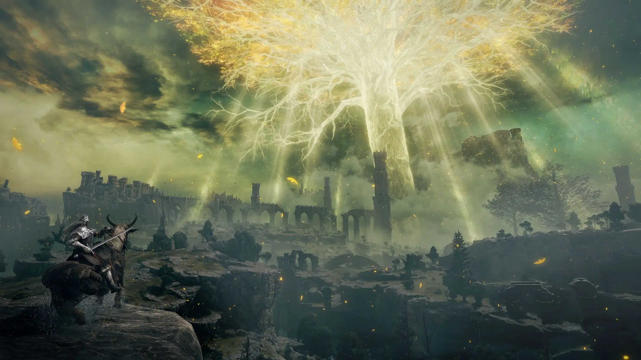 Uma gigantesca árvore brilhante no centro de uma paisagem em ruínas em uma captura de tela do Elden Ring.