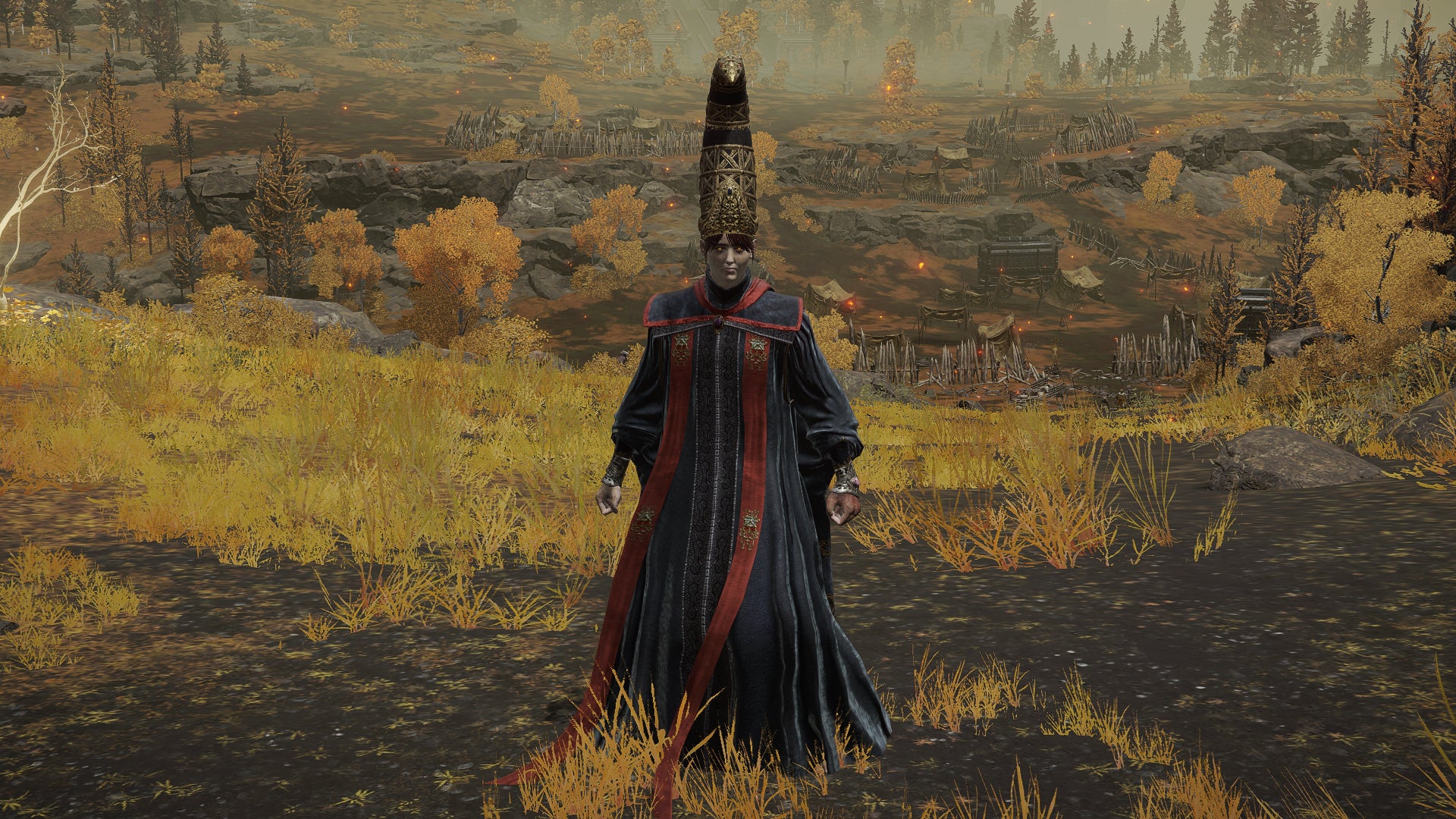 The player in Elden Ring stands in front of the camera wearing the Queen Of The Full Moon armour set. Behind them is a view of the Altus Plateau.