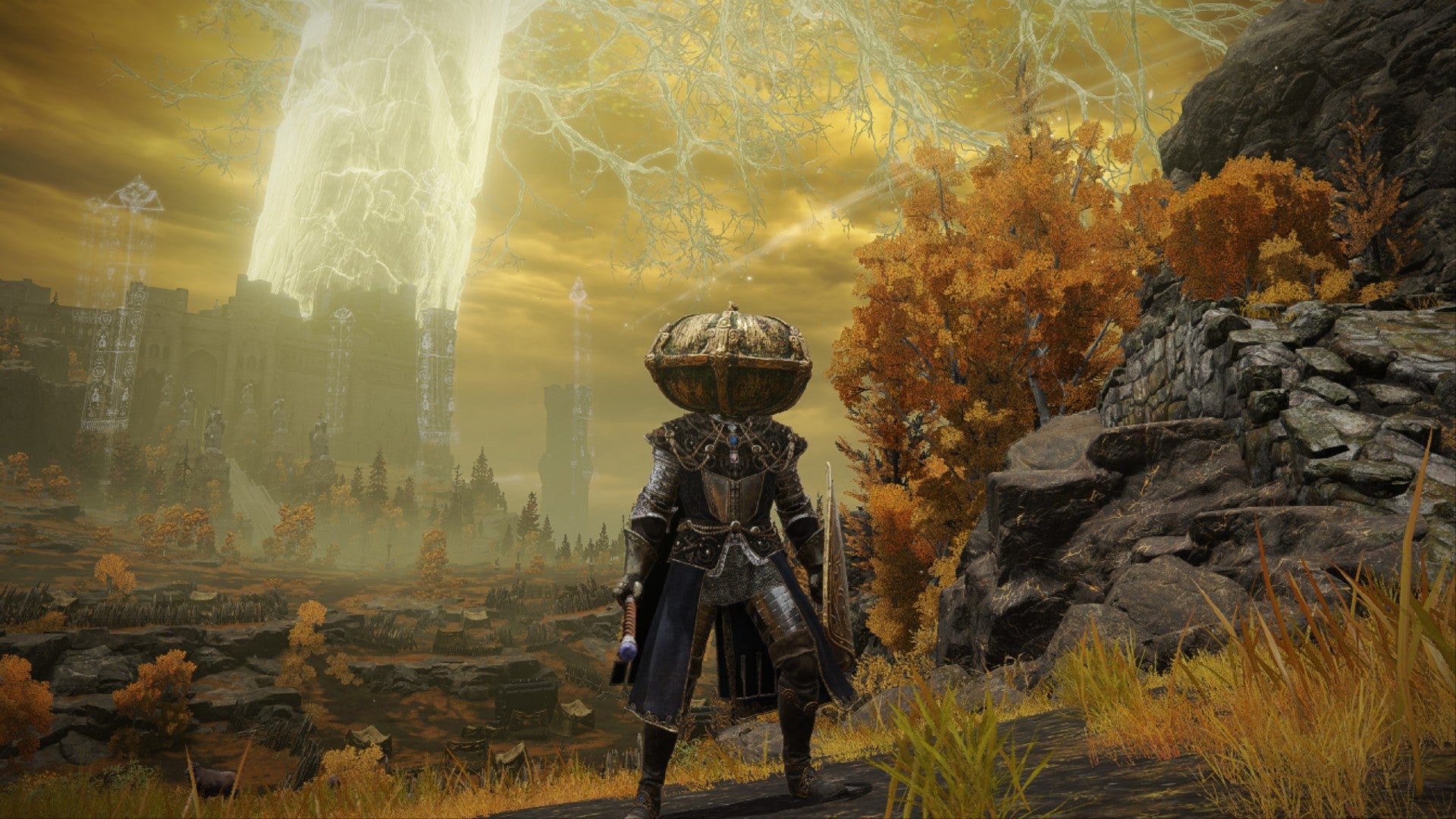 Elden Ring player sporting a Pumpkin Helm and knight armor on the Erdtree-Gazing Hill