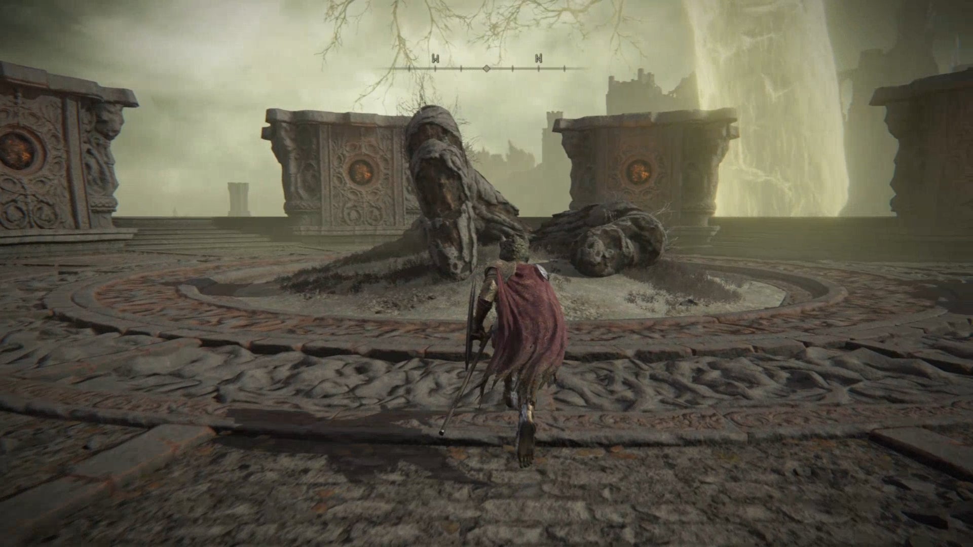 Elden Ring: the player stands on the summit of the Divine Tower of Caelid, looking at the point between the Two Fingers where General Radahn's Great Rune can be activated.