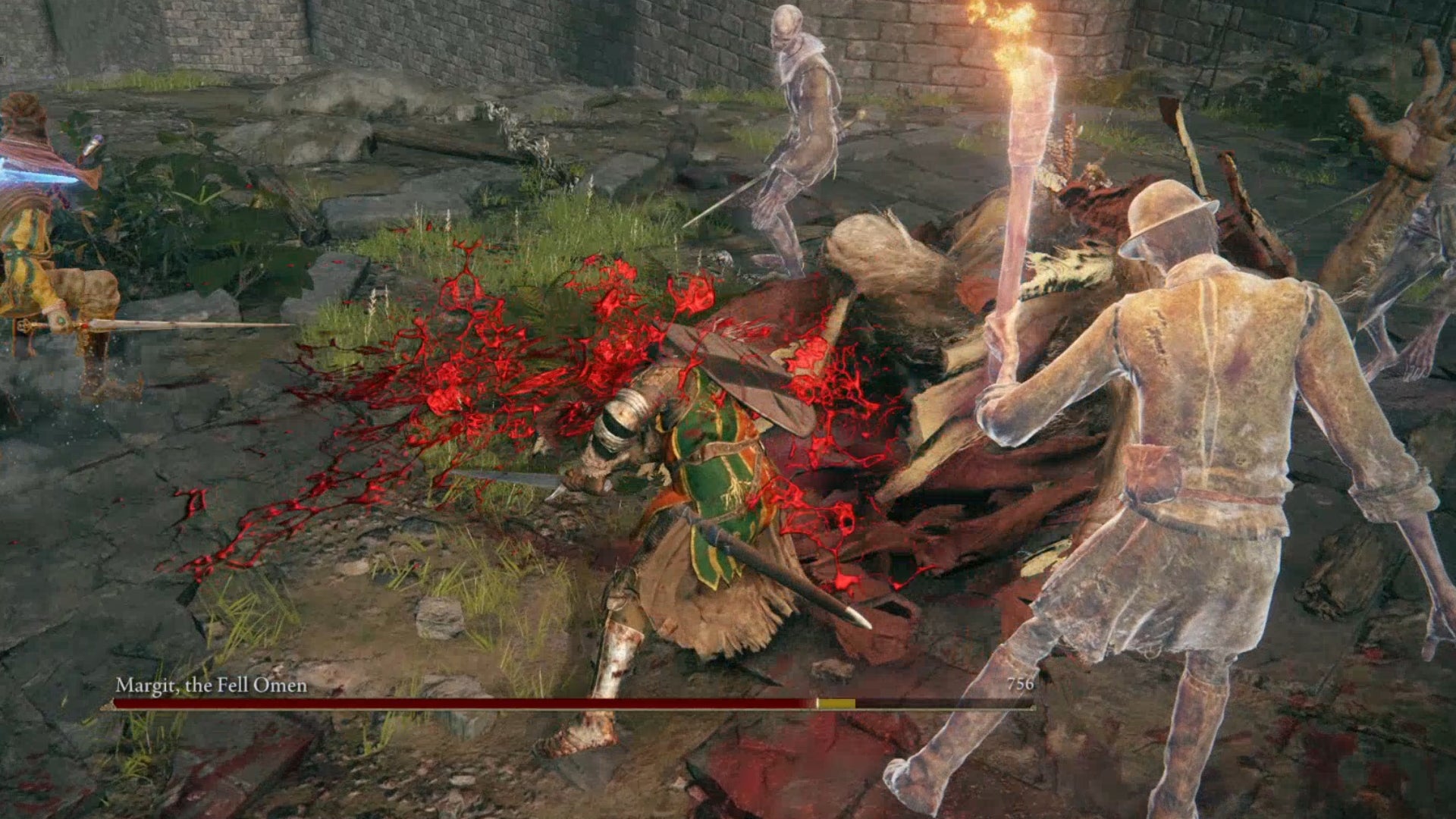 The player in Elden Ring staggers and then crits Margit, causing blood to spray across the ground.