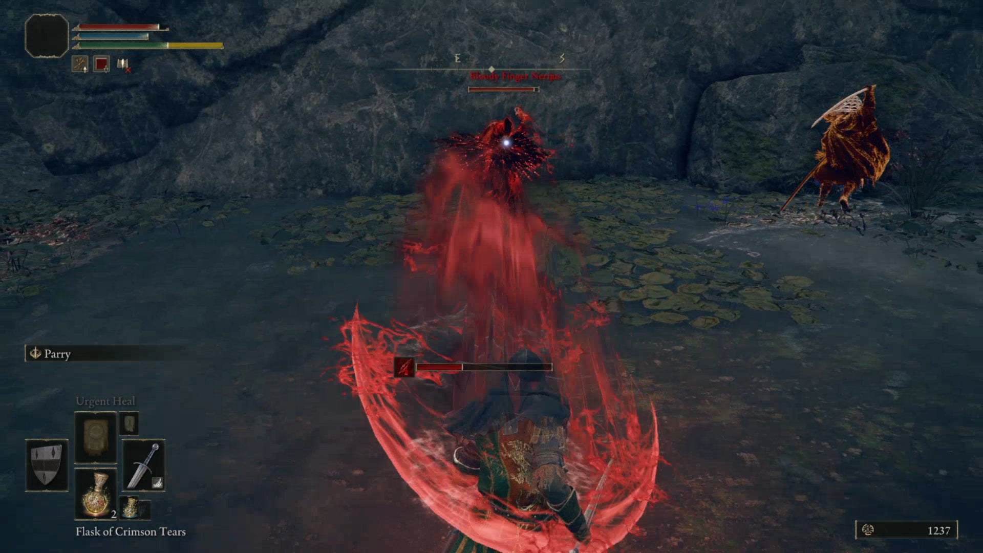 Bloody Finger Nerijus, a miniboss in Elden Ring, uses his dagger to fire an arc of blood magic towards the player.