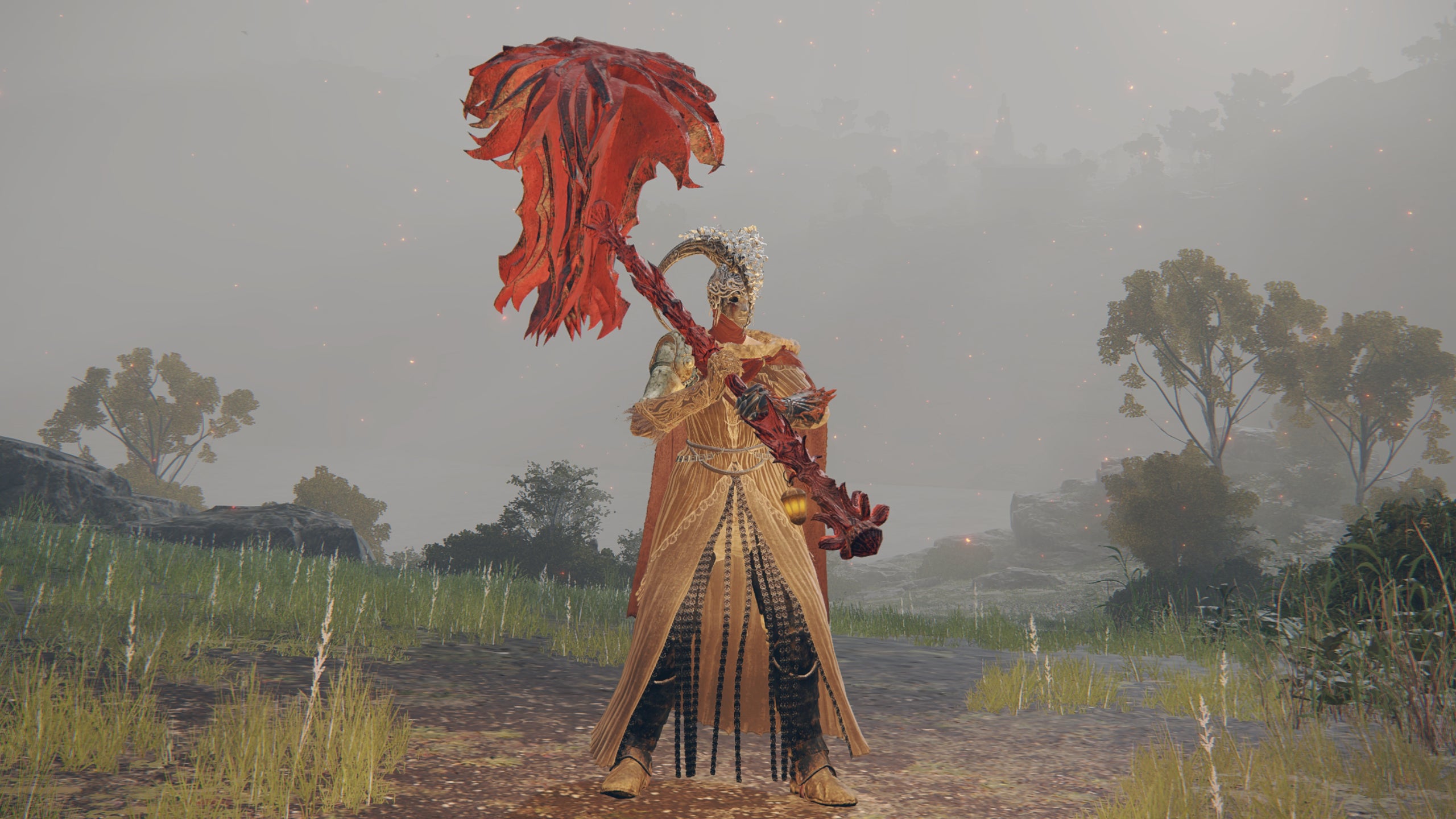 The player in Elden Ring stands in front of the camera wielding the Prelate's Inferno Crozier weapon.
