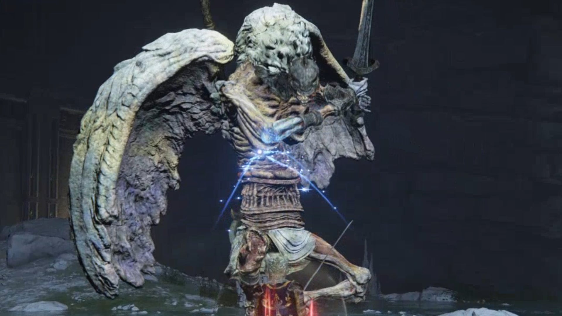 A Valiant Gargoyle boss in Elden Ring raises its sword to strike at the player below.