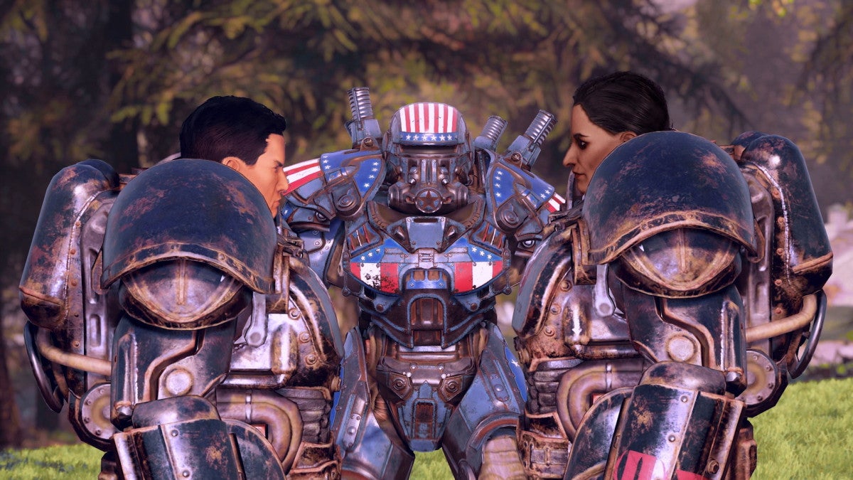 Some Brotherhood of Steel folks standing around in their red, white and blue power armour.