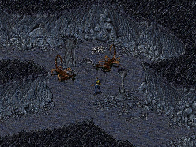 A Vault dweller fights monsters in a cave in the original Fallout