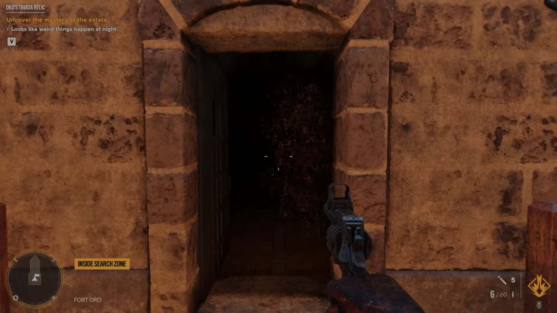 A screenshot of the open door to Fort Oro, home of Oku's Triada Relic in Far Cry 6.