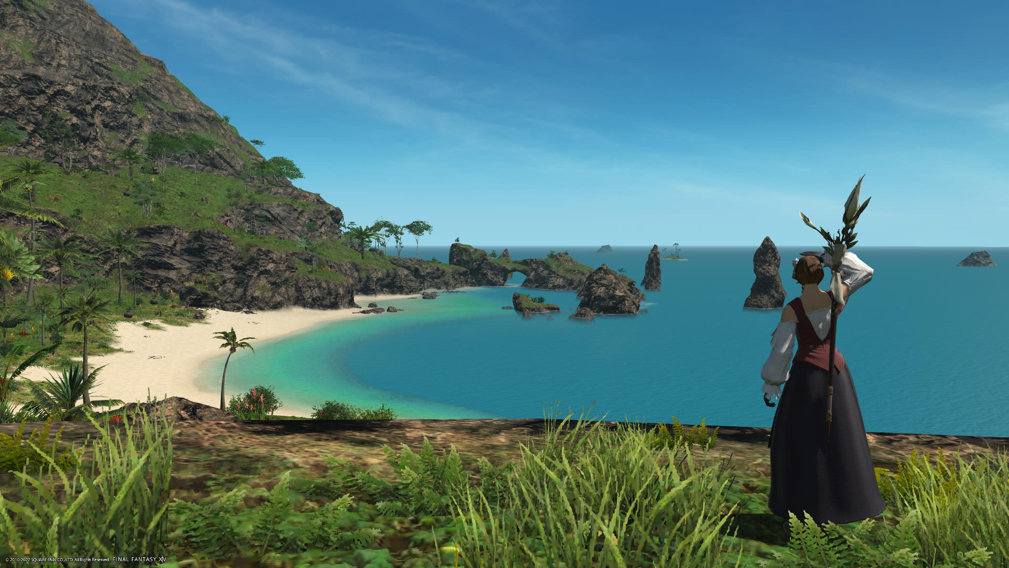 The player stands looking over a beautiful bay in their Island Sanctuary in Final Fantasy XIV