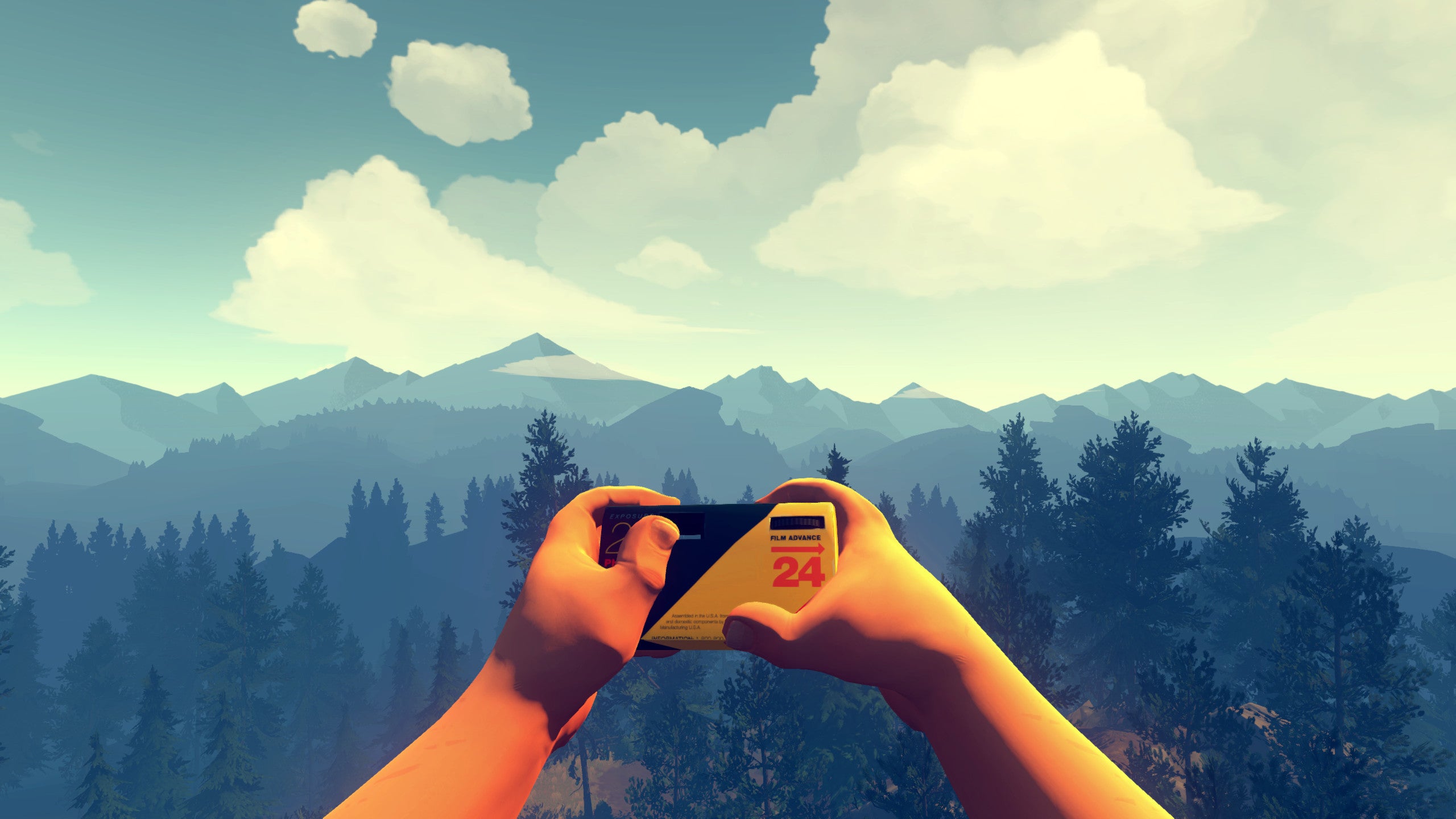 Holding a camera up ready to take a photo of mountains in a Firewatch screenshot.