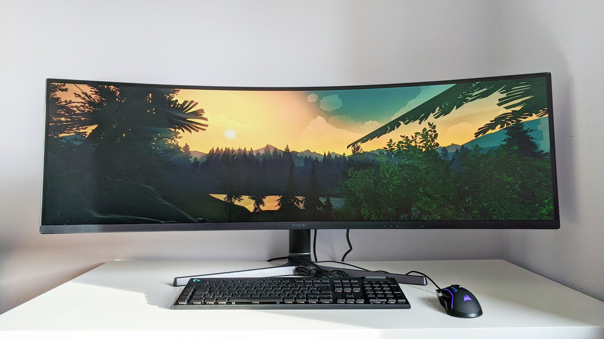 A photo of an ultrawide gaming monitor running Firewatch