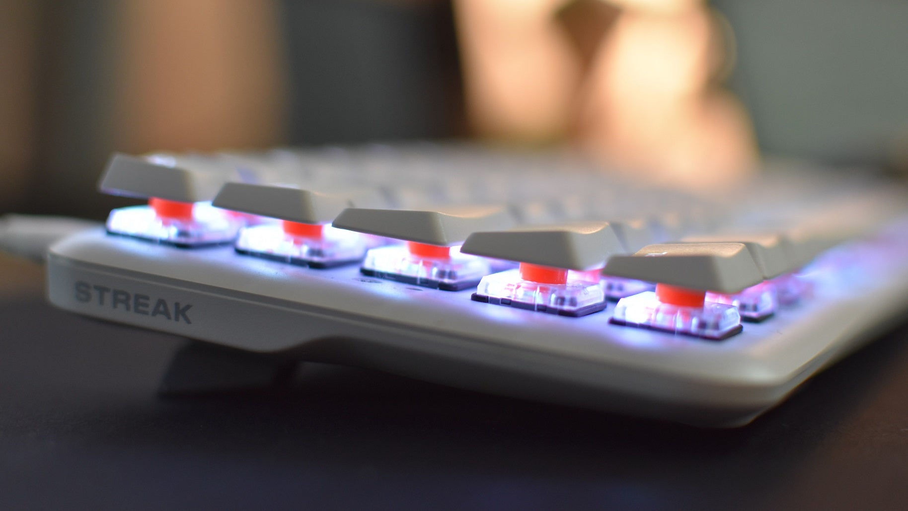 Side view of the Fnatic Streak65 LP gaming keyboard, showing its low profile mechanical switches.