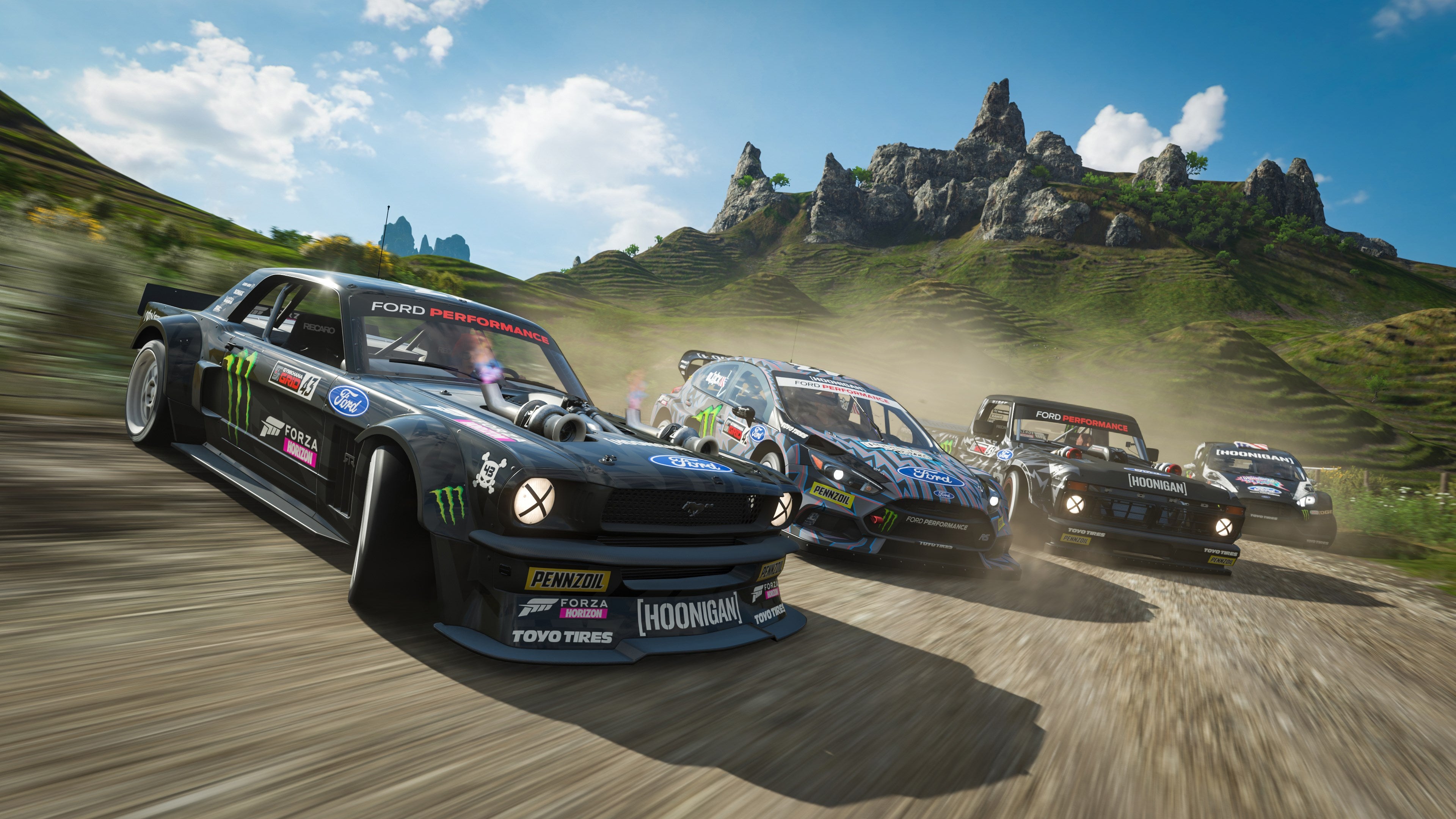 Cars drifting in a Forza Horizon 4 screenshot.