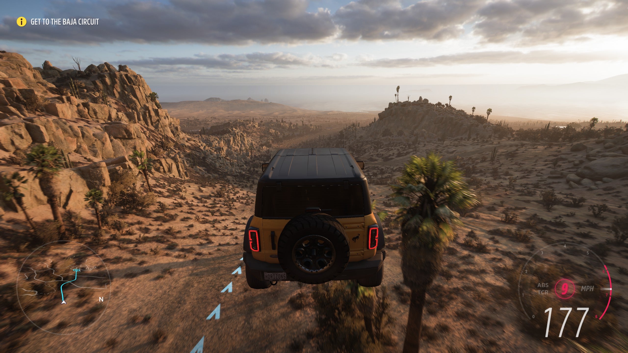 A jeep makes a huge jump in Forza Horizon 5.