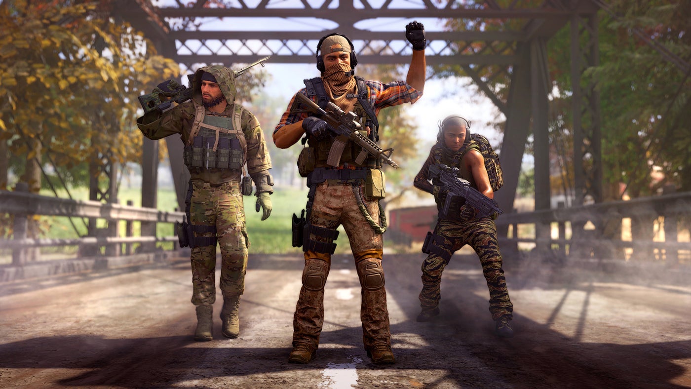 An image of Ghost Recon Frontline showing three people with guns. As per.
