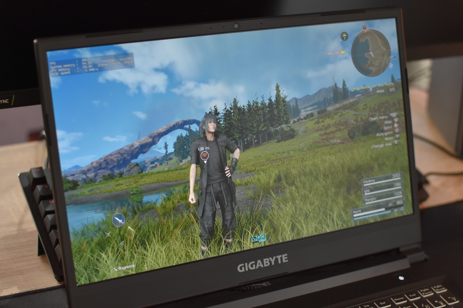 The Gigabyte G5 gaming laptop showing a scene from Final Fantasy XV on its display.