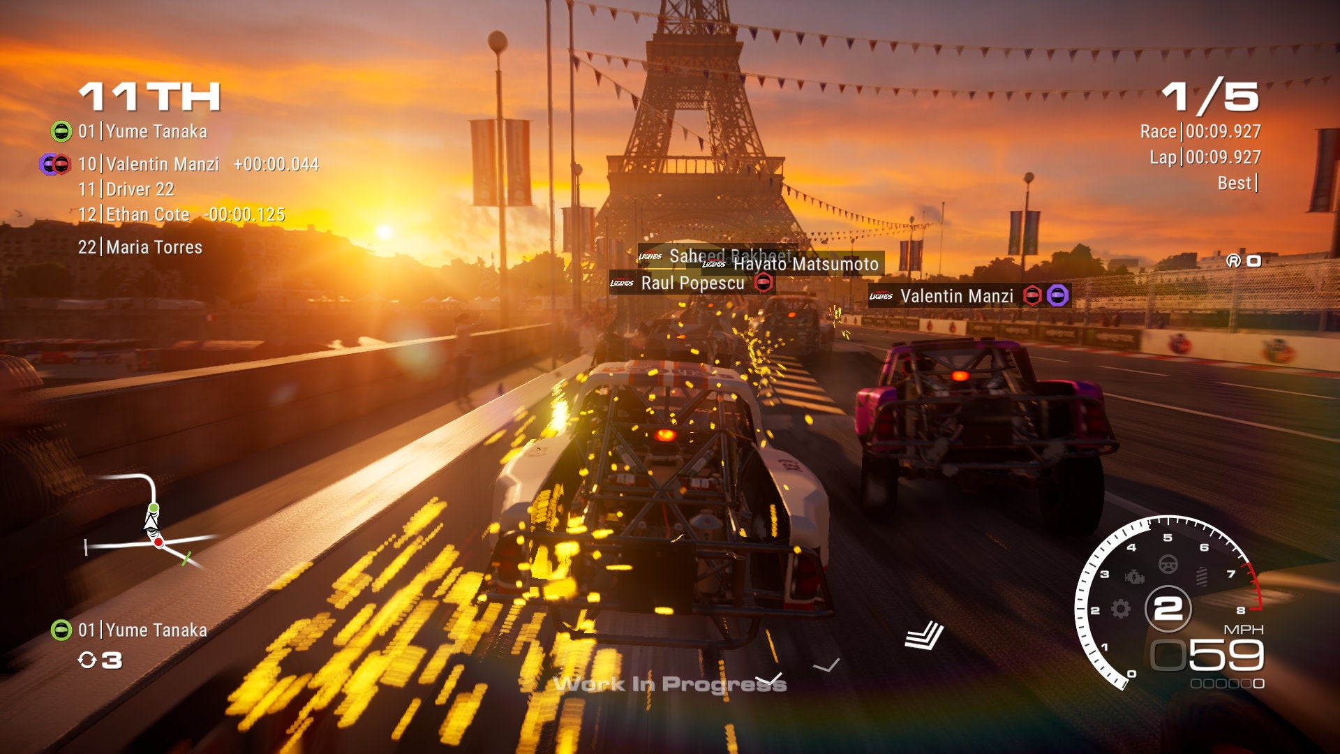 Race cars jostle for position in front of the Eiffel Tower in GRID Legends