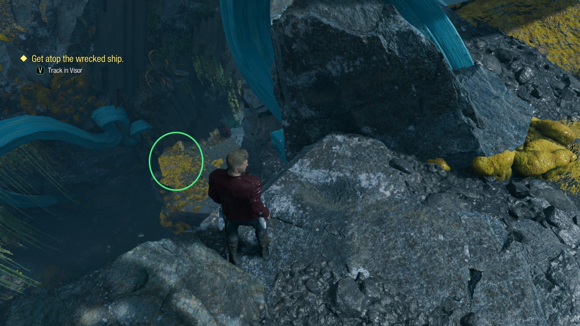 Star-Lord standing on cliff edge with collectible on ground below circled