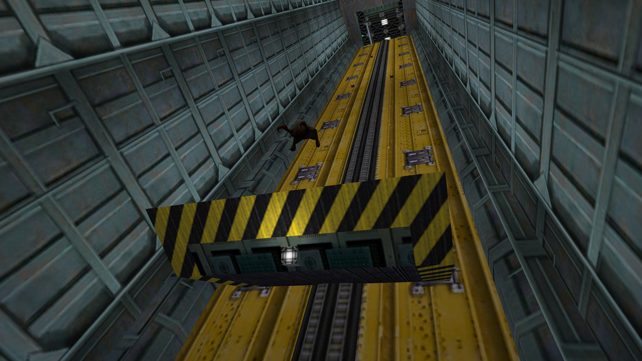 A headcrab rockets down a Black Mesa funicular shaft in a Half-Life screenshot.