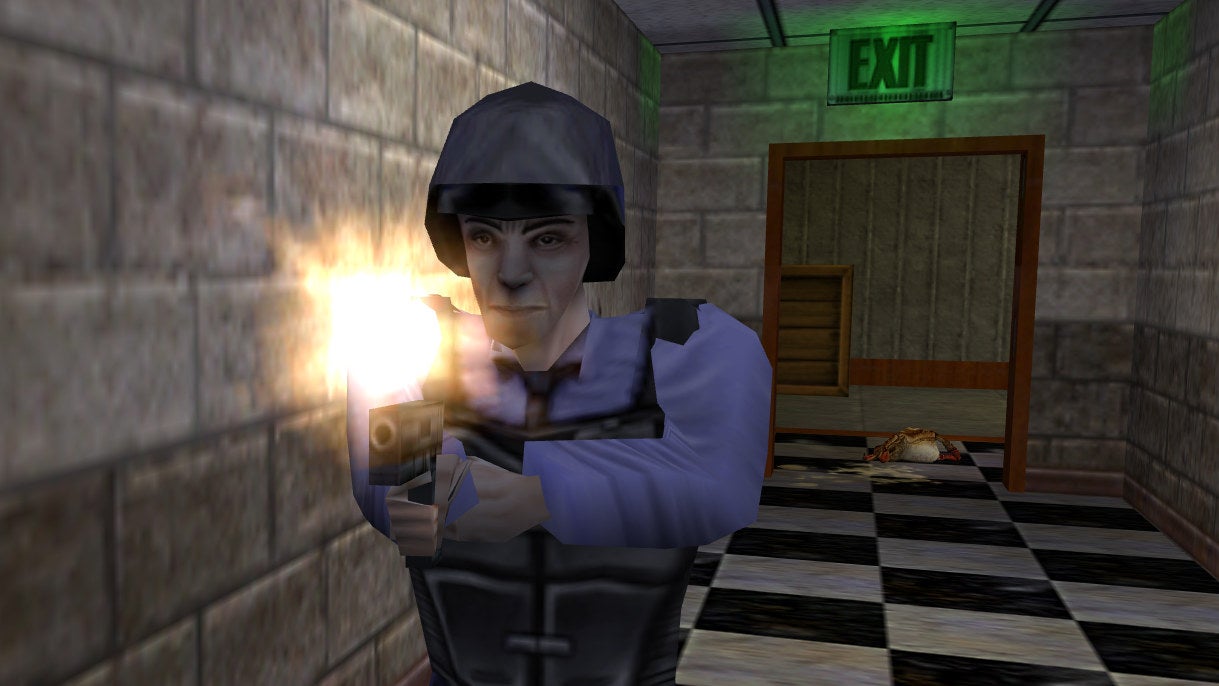 A Black Mesa security guard fires their pistol in a Half-Life screenshot.