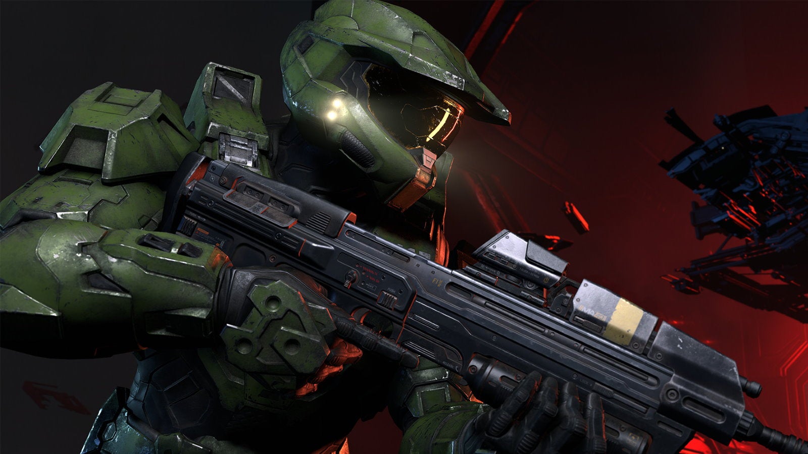 A side-on shot of Master Chief holding a gun in Halo Infinite