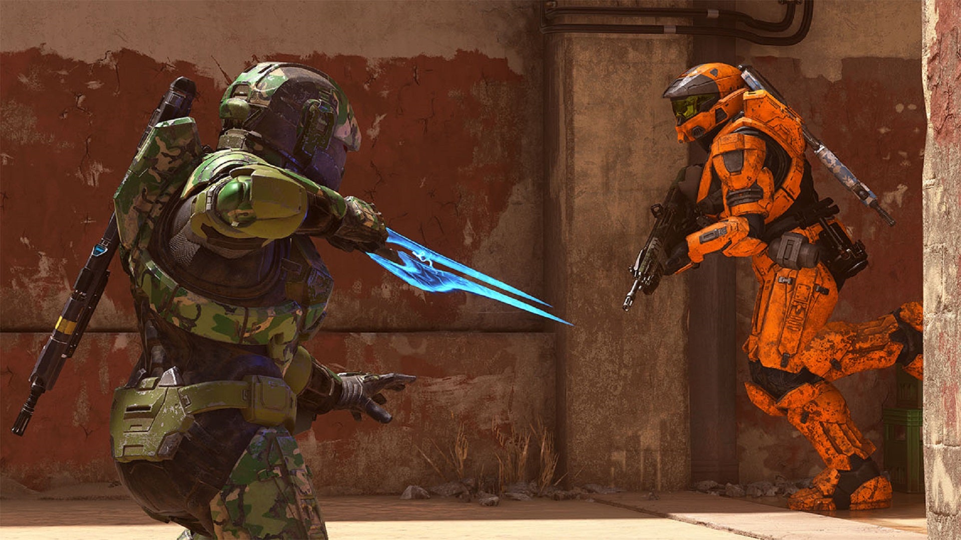 Two Spartans — one in green, one in orange armour — face off against each other in Halo Infinite multiplayer.