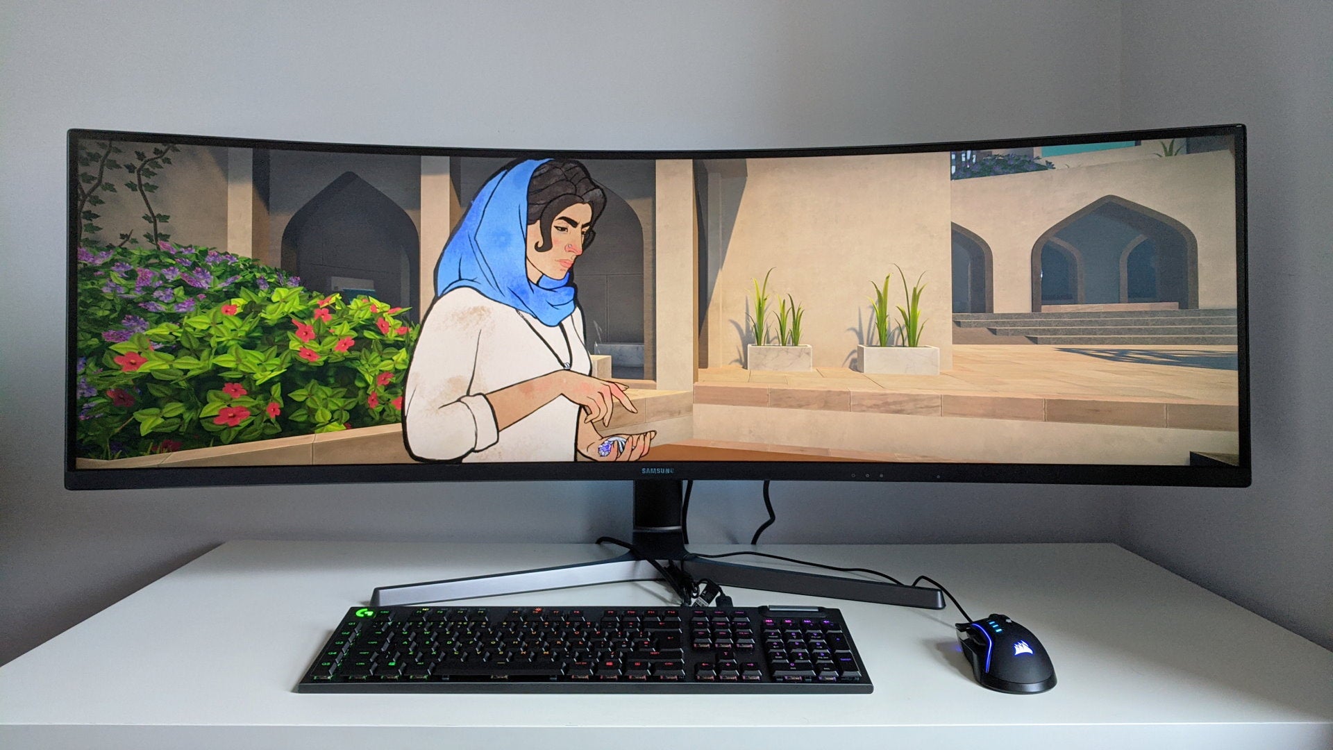A photo of an ultrawide gaming monitor running Heaven's Vault