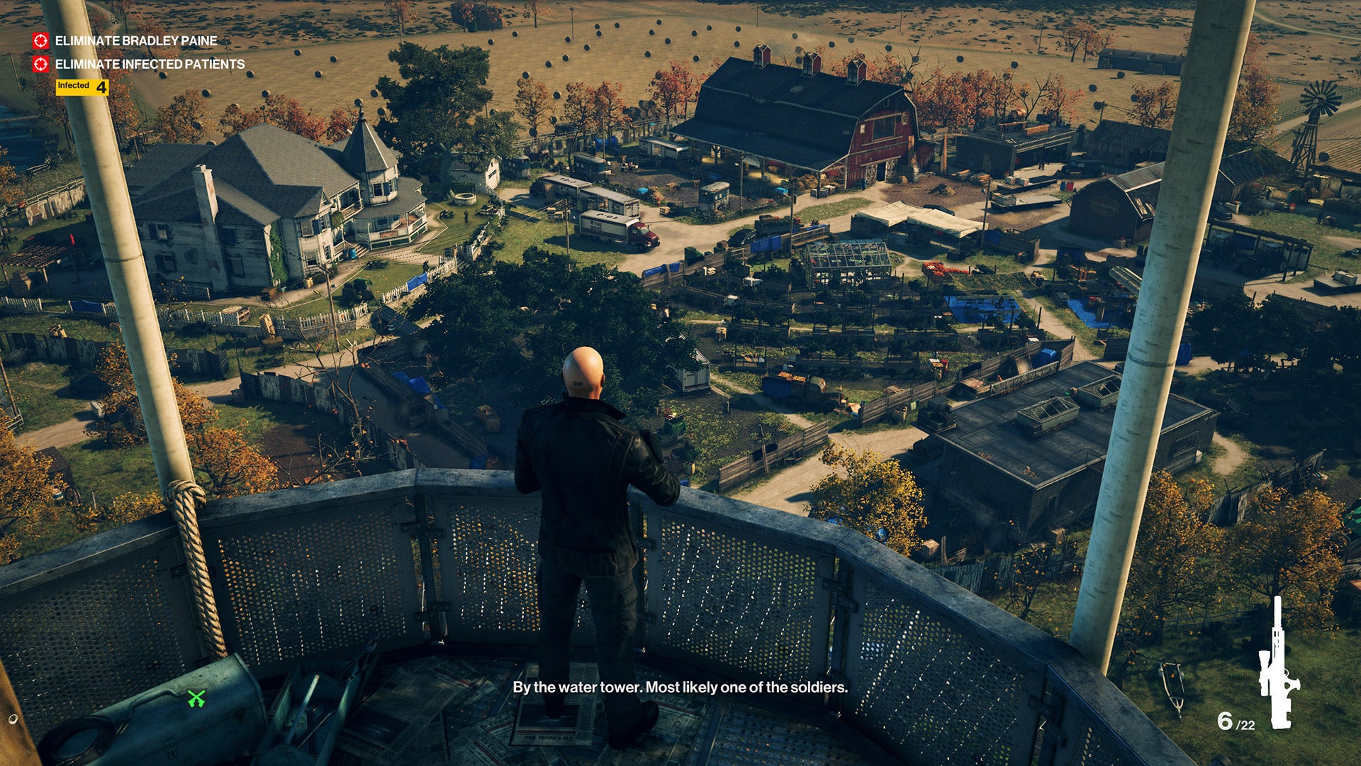 Agent 47 stands in a tower overlooking a slightly sus looking farm in the Colorado level. It is evident that he is in a sniper's nest.